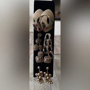 5 pair vintage silver tone pierced earrings.